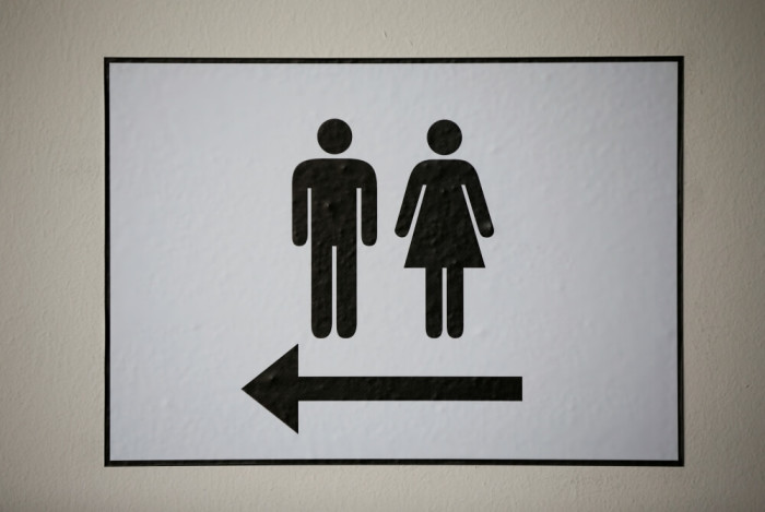 A sign points at the WC restrooms in Troisdorf near Bonn, western Germany, March 9, 2016.