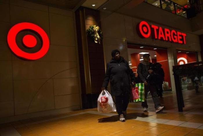 People shop at a Target store during Black Friday sales in the Brooklyn borough of New York, November 29, 2013.