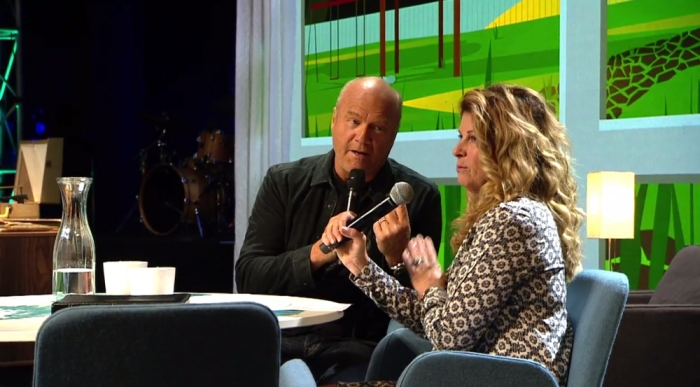 Pastor Greg Laurie interviews his wife Cathe during a message on marriage.