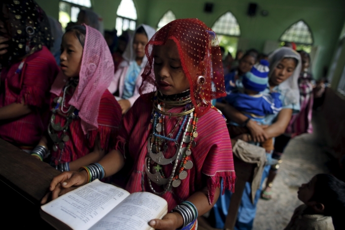 An ethnic Kayaw attend a mass at the catholic church at Htaykho village in the Kayah state, Myanmar September 13, 2015. With about 30,000 members, the Kayaw are one of the smallest ethnic minorities among Myanmar's 135 groups.