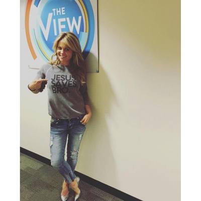 Candace Cameron Bure sports a shirt imprinted with the phrase 'Jesus Saves, Bro' on the set of 'The View' in New York, New York on April 29, 2016.