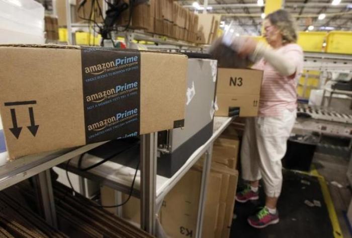 An Amazon employee prepares for delivery at the distribution center in Phoenix, Arizona.