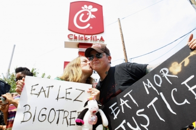 Jennifer and Jessie McNulty (R), participate during the nationwide 'kiss-in' at a Chick-Fil-A restaurant in Decatur, Georgia on August 3, 2012 to protest the fast-food chain president's opposition to homosexual unions. Same Sex Kiss Day is a reaction to comments made last week from Chick-Fil-A CEO Dan Cathy who supports the biblical definition of the 'family unit.'