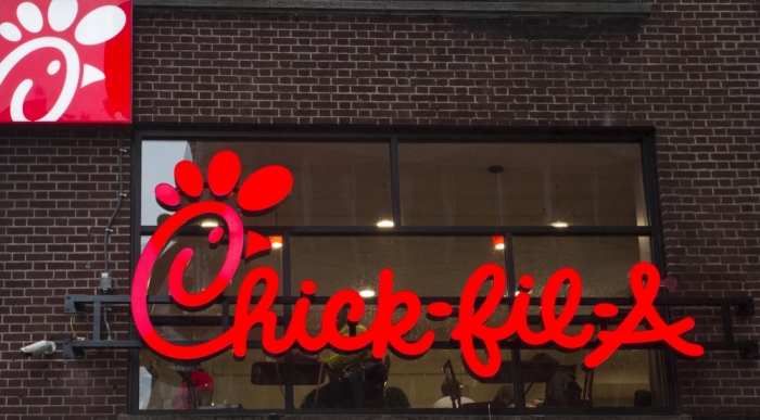 A franchise sign is seen above a Chick-fil-A freestanding restaurant after its grand opening in Midtown, New York, October 3, 2015.