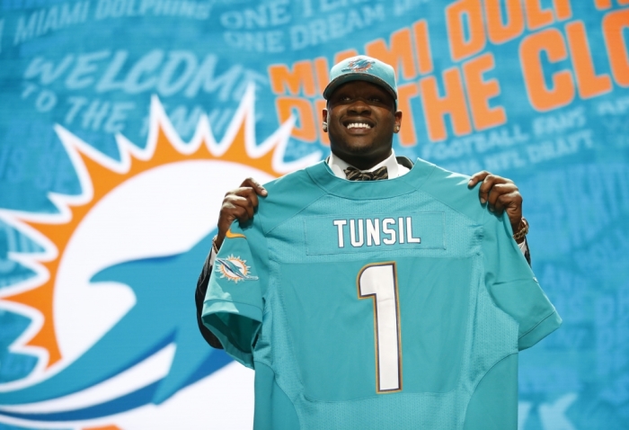 Apr 28, 2016; Chicago, IL, USA; Laremy Tunsil (Mississippi) is selected by the Miami Dolphins as the number thirteen overall pick in the first round of the 2016 NFL Draft at Auditorium Theatre.