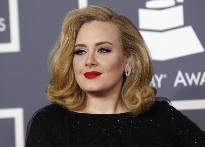 British singer Adele arrives at the 54th annual Grammy Awards in Los Angeles, California, February 12, 2012.