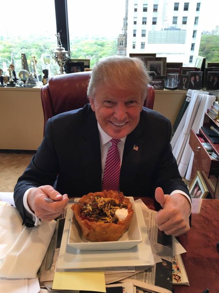 Posted to Donald Trump's Facebook page with the caption: 'Happy Cinco de Mayo! The best taco bowls are made in Trump Tower Grill. I love Hispanics! — at Trump Tower New York.'