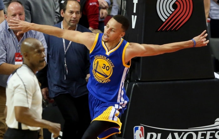 May 9, 2016; Portland, OR, USA; Golden State Warriors guard Stephen Curry (30) celebrates a 132-125 win in overtime over Portland Trail Blazers in game four of the second round of the NBA Playoffs at Moda Center at the Rose Quarter.