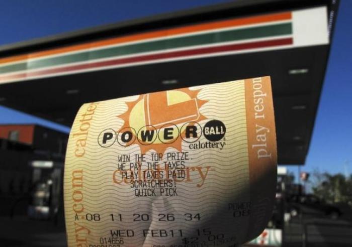 A powerball Lottery ticket is shown in this photo illustration after being purchased at a gas station in San Diego, California, February 10, 2015.