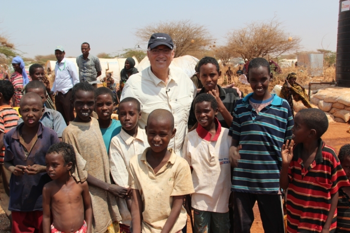 World Help President Vernon Brewer with refugees in Kenya