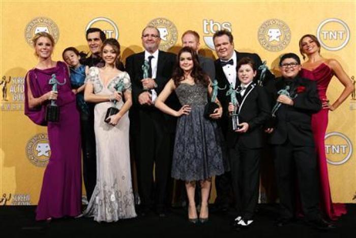 The cast of ''Modern Family'' pose backstage after the show won outstanding performance by an ensemble in a comedy series at the 18th annual Screen Actors Guild Awards in Los Angeles, California January 29, 2012.