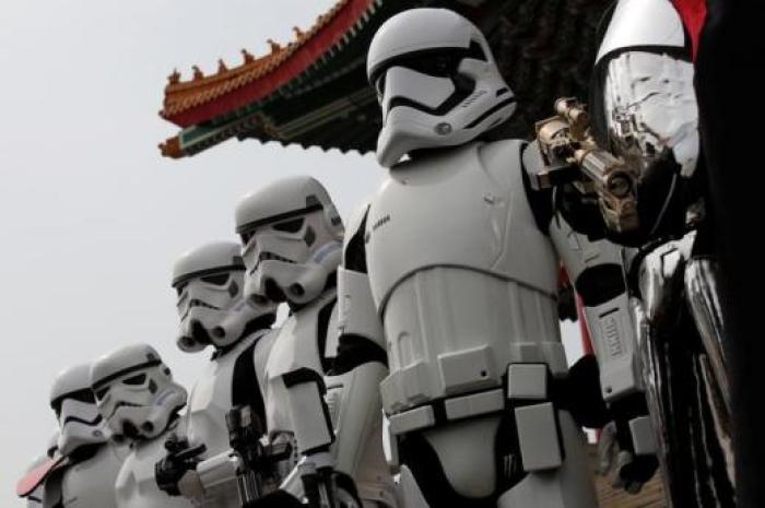 Fans dressed as Storm Troopers from 'Star Wars' pose for a photo during Star Wars Day in Taipei, Taiwan, May 4, 2016.