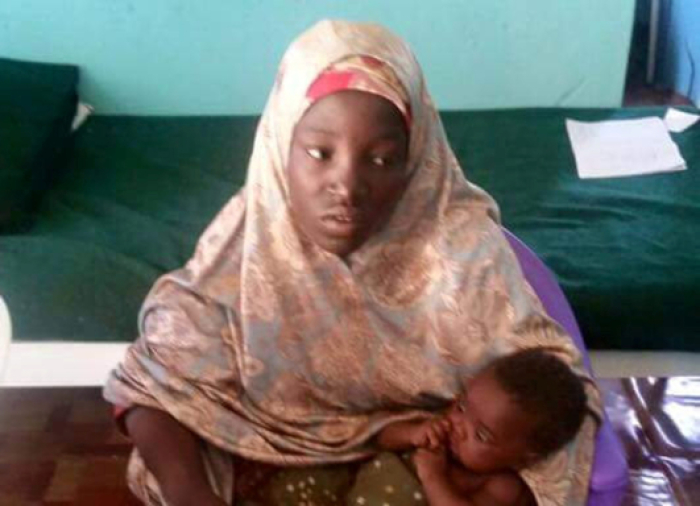 Undated picture released May 18, 2016 by Nigeria army of rescued Chibok schoolgirl and her baby in Maiduguri, Nigeria. She was kidnapped by Boko Haram from her school in Chibok more than two years ago.