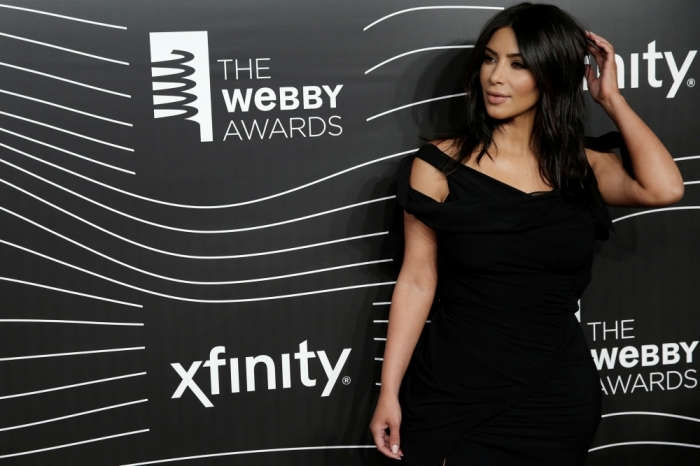 Kim Kardashian West poses as she arrives for the 20th Annual Webby Awards in Manhattan, New York, U.S., May 16, 2016.