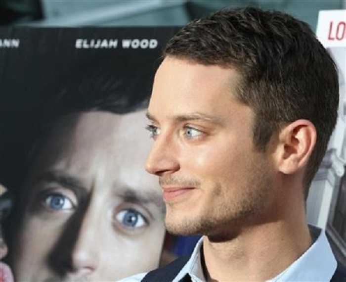 Elijah Wood, star of 'Wilfred' arrives at the FX Network series premiere of 'Wilfred' and season two launch of 'Louie' in Hollywood, California June 20, 2011.