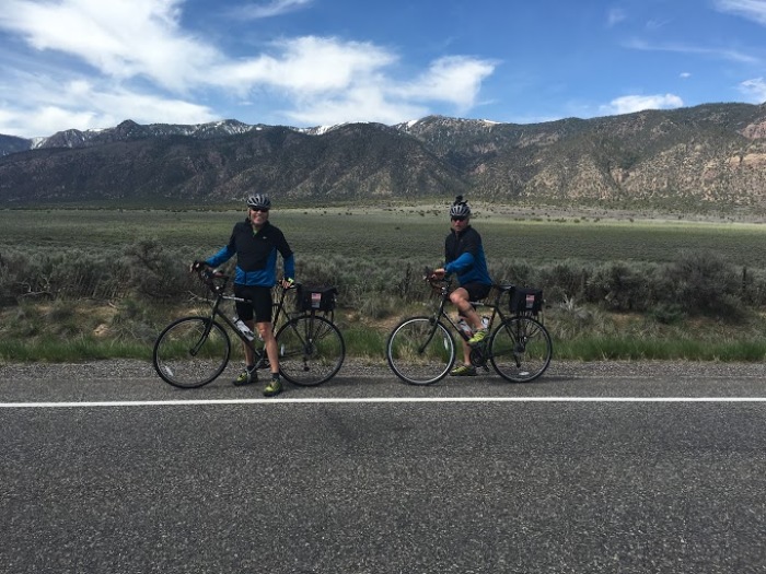 U.S. Army veteran David Allison (L) and U.S. Marine veteran Michael Priddy (R) riding their bicycles during their 47-day, cross-country No Man Rides Alone bike tour supporting combat veterans struggling with post traumatic stress disorder and the Mighty Oaks Warrior Programs in this undated photo.