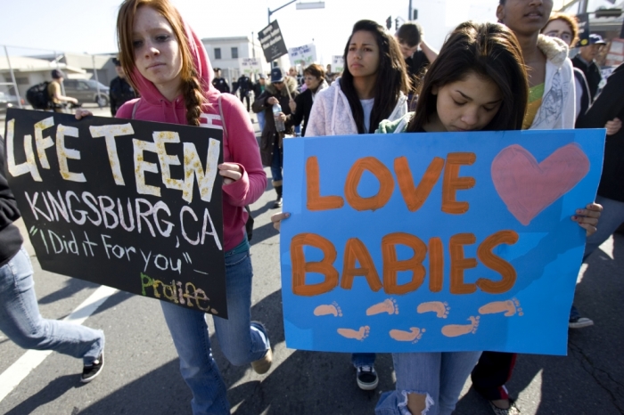 Anti-abortion activists protest in San Francisco, California, January 19, 2008. Thousands of people marched through the streets of San Francisco in the fourth annual 'Walk For Life West Coast' calling for an end to legal abortions.