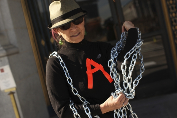 Reiko Redmonde wears chains during a pro-abortion rally at City Hall in San Francisco, California, January 22, 2013.