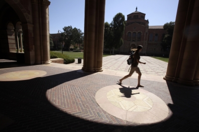 A student walks on the University of California Los Angeles (UCLA) campus in Los Angeles, September 18, 2009.