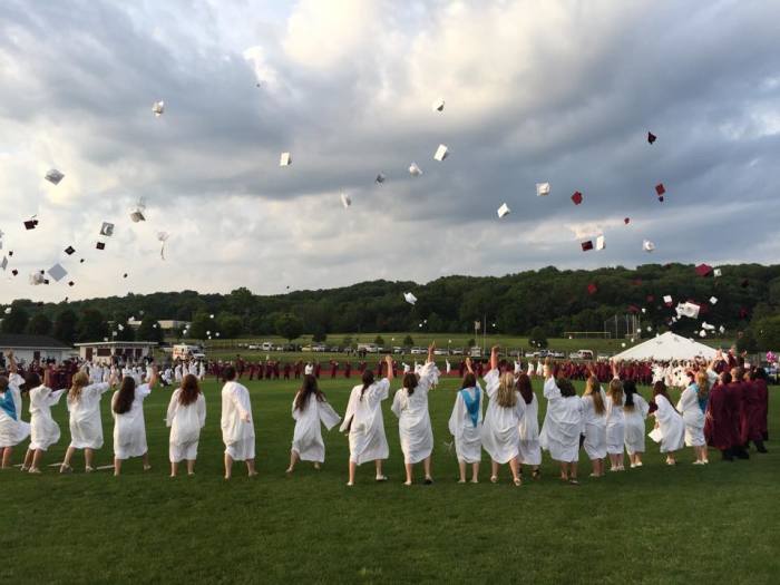 Graduates of Pottsgrove High School throw their graduation caps in the air in this picture posted to Facebook on June 13, 2015.