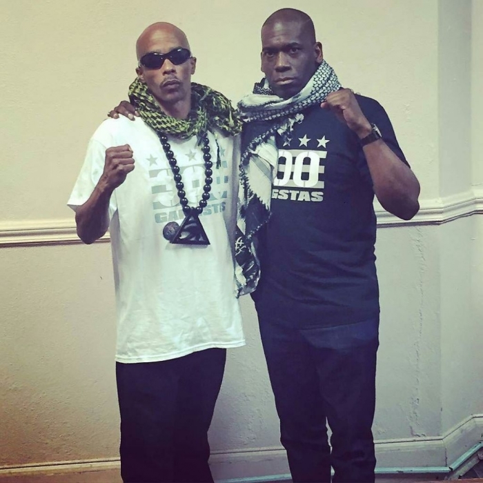 Grassroots community activist PFK Boom (L) and Pastor Jamal Bryant (R) of Baltimore's Empowerment Temple church.