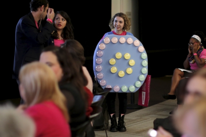 Valerie Marchesi, dressed as a package of birth control pills, waits for U.S. Democratic presidential candidate Hillary Clinton to be publicly endorsed by Planned Parenthood Action Fund in Hooksett, New Hampshire, January 10, 2016.