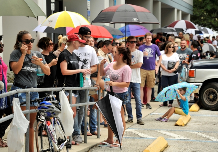 Hundreds of community members line up outside a clinic to donate blood after an early morning shooting attack at a gay nightclub in Orlando, Florida, U.S., June 12, 2016.