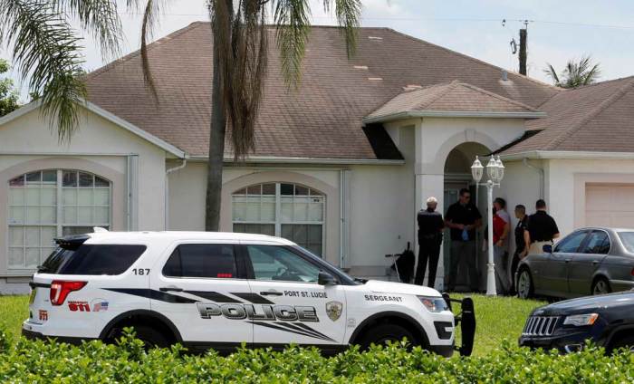 Police stand in front of one of the houses that officials indicated was connected to the Orlando shooter in Port St. Lucie, Florida, U.S. June 12, 2016.