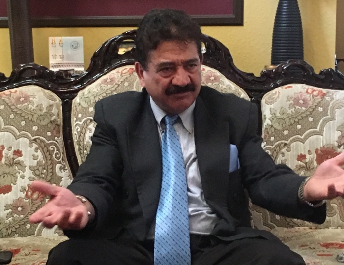 Seddique Mateen, the father of Omar Mateen, who attacked a gay night club in Orlando before being shot dead by police, speaks with reporters at his home in Port Saint Lucie, Florida, U.S. June 13, 2016.