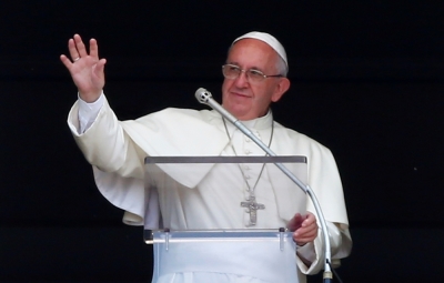 Pope Francis waves during his Sunday Angelus prayer in Saint Peter's square at the Vatican, Rome, Italy, June 19, 2016.