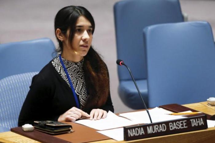 Nadia Murad Basee, a 21-year-old Iraqi woman of the Yazidi faith, speaks to members of the Security Council during a meeting at the United Nations headquarters in New York, December 16, 2015.