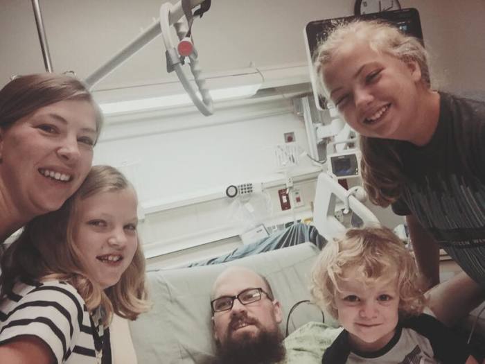 Following the amputation of both of his feet in early June to stave off a critical infection, Big Daddy Weave bassist and singer, Jason Weaver, is mended and heading home. In this undated photo taken around the time of his surgery in June 2016, Weaver poses with his wife and three daughters.