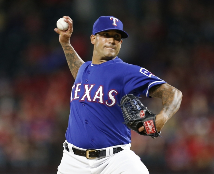 Texas Rangers relief pitcher Matt Bush (51) delivers a pitch to the Toronto Blue Jays at Globe Life Park in Arlington, Texas, Bush made his MLB debut during the game. The Blue Jays won 5-0, May 13, 2016.