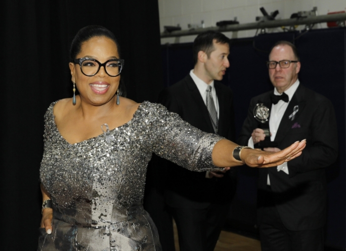 Media mogul Oprah Winfrey poses backstage during the American Theatre Wing's 70th annual Tony Awards in New York, U.S., June 12, 2016.