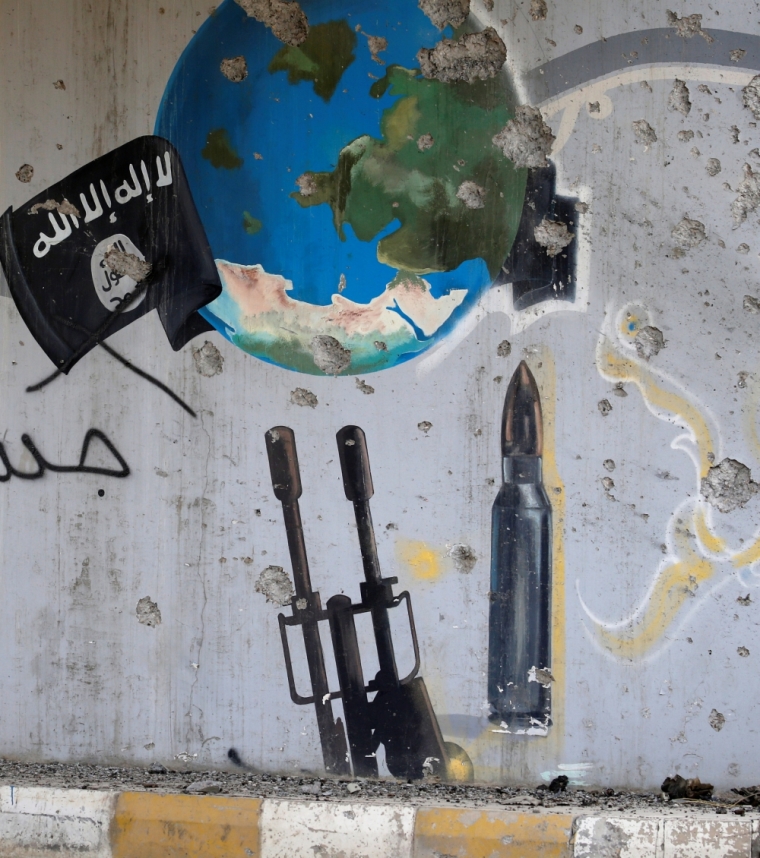 A wall painted by Islamic State militants is seen in Falluja, Iraq, June 26, 2016.