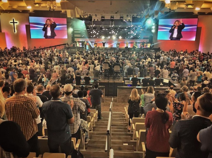 Attendees gather Tuesday morning for the Purpose Driven Conference, organized by Saddleback Church