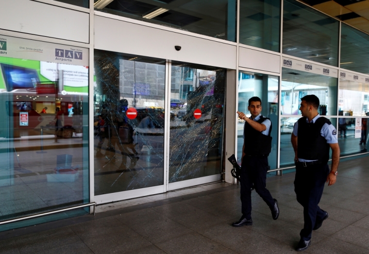 Police officers patrol at Turkey's largest airport, Istanbul Ataturk, following yesterday's blast June 29, 2016.