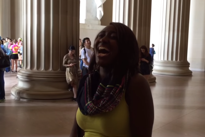 Star Swain, 34, sings the National Anthem at the Lincoln Memorial.