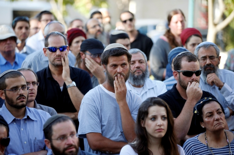 Relatives and friends attend the funeral of Israeli girl, Hallel Yaffa Ariel, 13, who was killed in a Palestinian stabbing attack in her home in the West Bank Jewish settlement of Kiryat Arba, at a cemetery in the West Bank city of Hebron, June 30, 2016.
