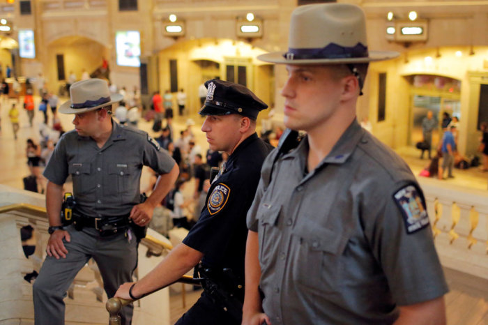 State and Transit police monitor commuters at Grand Central Station as security increases leading up to the Fourth of July weekend in Manhattan, New York, U.S., July 1, 2016. Picture taken July 1, 2016.