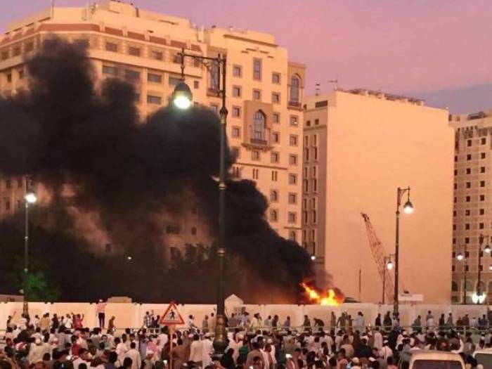 Worshippers gather after a suicide bomber detonated a device near the security headquarters of the Prophet's (pbuh) Mosque in Medina, Saudi Arabia, July 4, 2016.