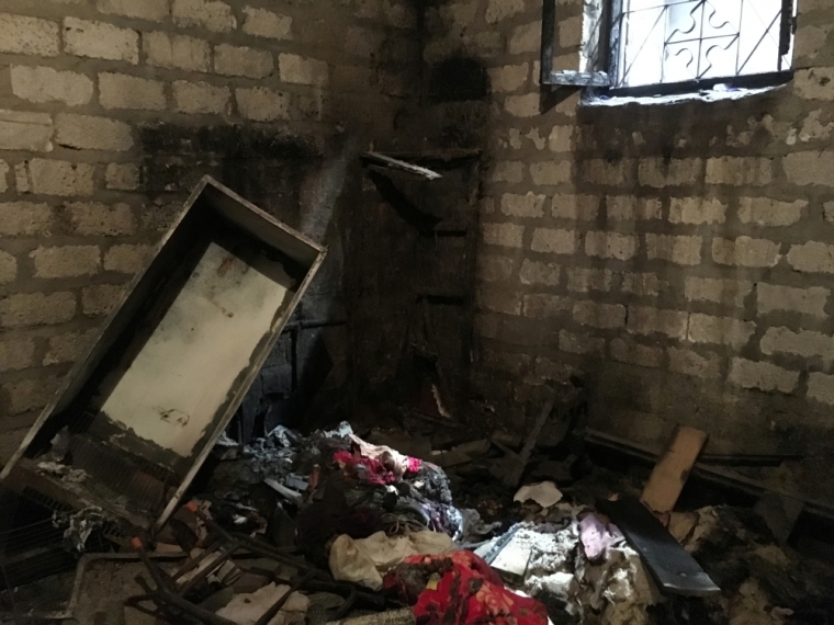 A damaged home belonging to one of seven Christian families, whose houses were looted and set on fire by Muslim men, is seen at Al-Karm village in the southern province of Minya, Egypt, May 27, 2016.