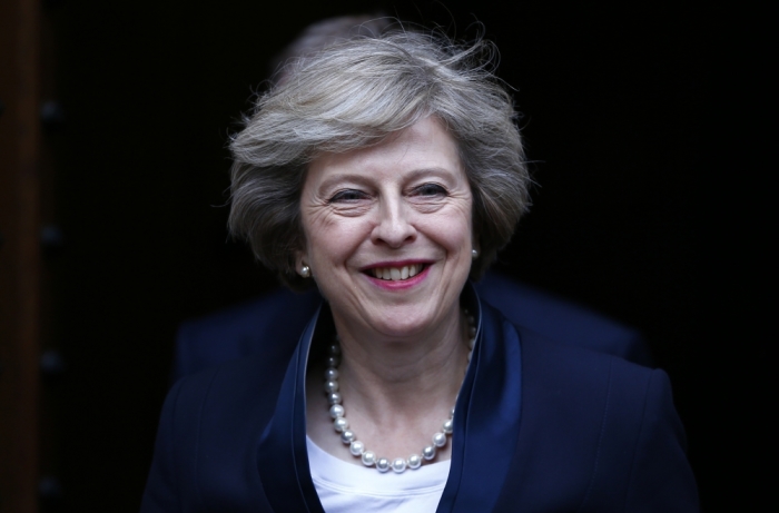 Theresa May emerges to speak to reporters after being confirmed as the leader of the Conservative Party and Britain's next Prime Minister outside the Houses of Parliament in Westminster, central London, July 11, 2016.