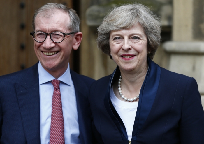 Theresa May emerges with her husband Philip to speak to reporters after being confirmed as the leader of the Conservative Party and Britain's next Prime Minister outside the Houses of Parliament in Westminster, central London, July 11, 2016.