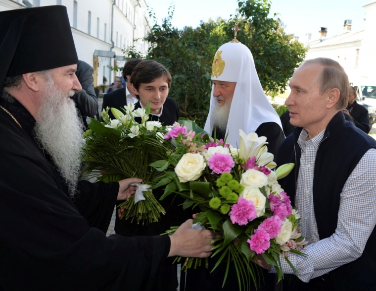 Russian President Vladimir Putin and Patriarch of Moscow and All Russia Kirill visit the Cathedral of the Transfiguration of the Savior at Valaam Monastery, Russia, July 11, 2016.