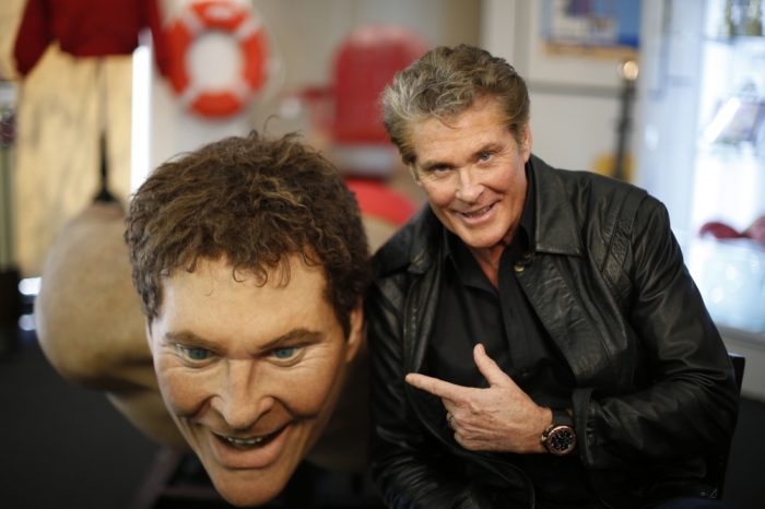 Actor David Hasselhoff poses with a replica of himself built for 'The SpongeBob SquarePants Movie', during an auction in Beverly Hills, California April 7, 2014.