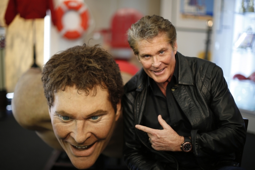 Actor David Hasselhoff poses with a replica of himself built for "The SpongeBob SquarePants Movie", during an auction in Beverly Hills, California April 7, 2014.