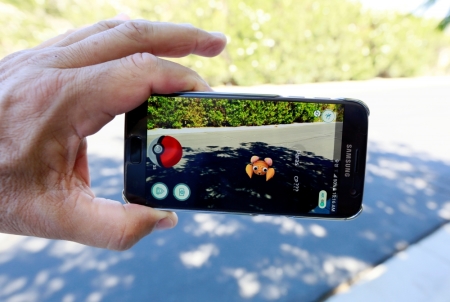 The augmented reality mobile game "Pokemon Go" by Nintendo is shown on a smartphone screen in this photo illustration taken in Palm Springs, California, July 11, 2016.