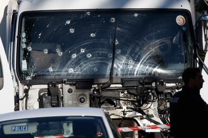 Bullet impacts are seen on the heavy truck the day after it ran into a crowd at high speed killing scores celebrating the Bastille Day July 14 national holiday on the Promenade des Anglais in Nice, France, July 15, 2016.