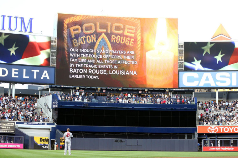 General view during a moment of silence for those affected by the tragic events in Baton Rouge, LA earlier today before a game between the New York Yankees and the Boston Red Sox at Yankee Stadium.